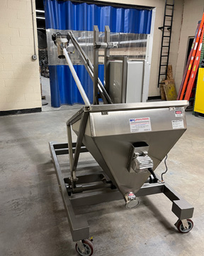 Tiltable AFC Spiralfeeder screw conveyor shown folded down for easy rolling through doorways